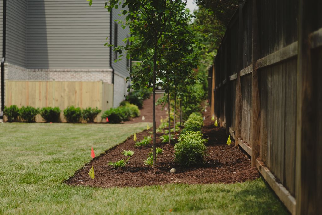 Fresh landscape bed with tree line install